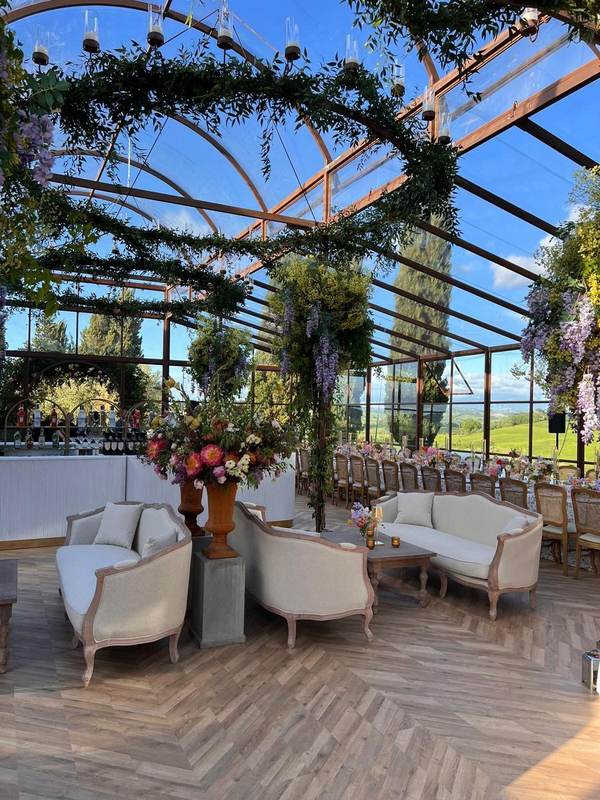 Elegant lounge area inside greenhouse