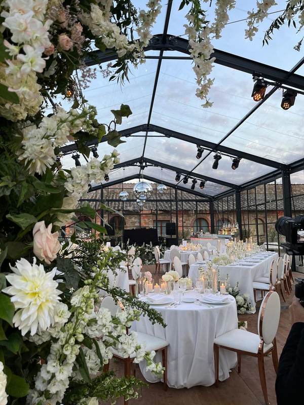 White wedding dinner under glass