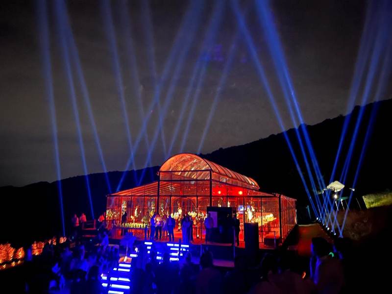 Spectacular light beams over greenhouse